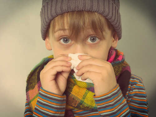 Boy,wiping,his,nose