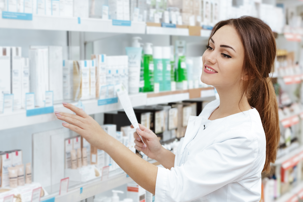Perfect,medication.,shot,of,a,young,beautiful,pharmacist,looking,for