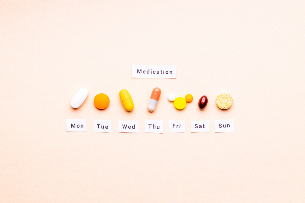 Medicine,drugs,daily,and,weekly,schedule,concept.,above,view.,drug